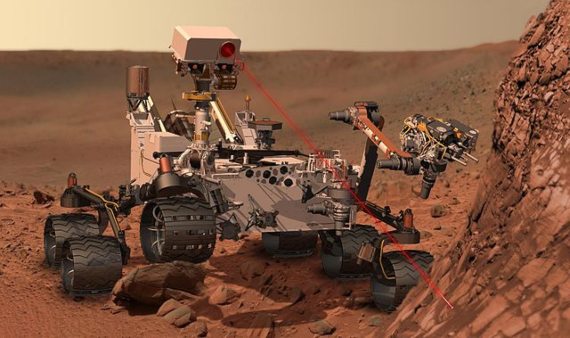 BBVA-OpenMind-Borja Tosar-Esperanzas y pistas falsas búsqueda de vida extraterre-Indicios vida- 6-Representación del rover 'Curiosity', usando su instrumento ChemCam para investigar la composición de una roca de la superficie marciana. Crédito: NASA/JPL-Caltech