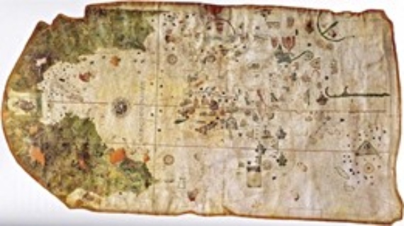BBVA-OpenMind-Navascues-viaje Magallanes-Elcano-3-El primer mapa del nuevo continente, realizado por Juan de la Cosa en 1500, que incluye las tierras conocidas en ese momento. La costa oeste del nuevo continente y el océano Pacífico eran desconocidos en ese momento. Museo Naval de Madrid